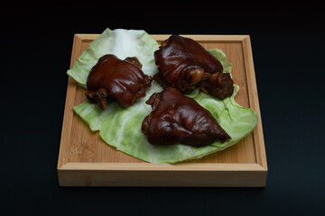 Chinese traditional delicacy marinated pig's feet.Braised pork trotters