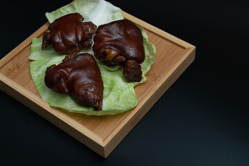 Chinese traditional delicacy marinated pig's feet.Braised pork trotters