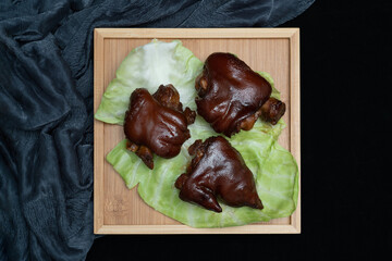 Chinese traditional delicacy marinated pig's feet.Braised pork trotters