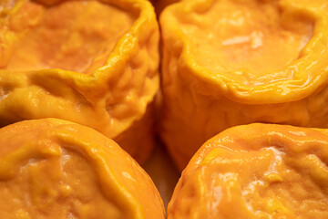 Soft cheese Langres, French cow milk. Creamy and crumbly orange colored, French cheeses collection. High quality photo