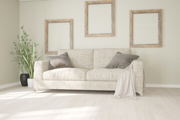 modern room with sofa,pillows,plaid,frames interior design. 3D illustration