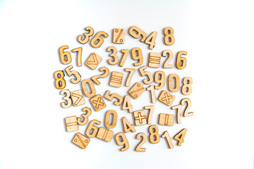 Wooden digits on white background.