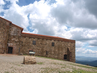 Fototapeta na wymiar Tentudía Monastery, a Mudejar-style church-fortress in the Spanish town of Calera de León, in the province of Badajoz, Calera de León, Spain