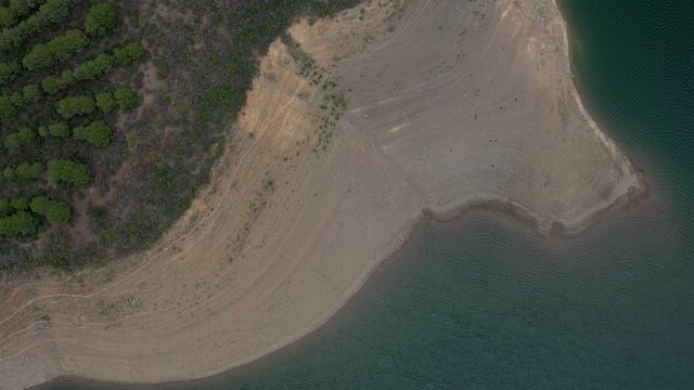 Top aerial drone view of Odeleite Dam reservoir in Algarve, Portugal