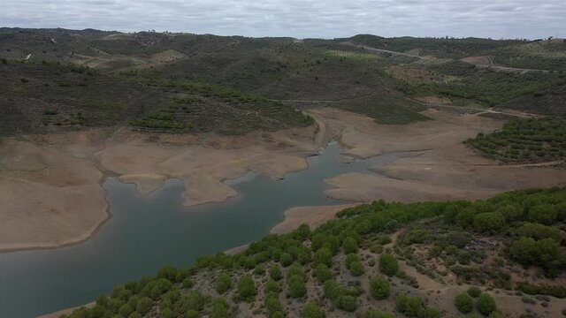 Aerial drone view of Odeleite Dam reservoir in Algarve, Portugal