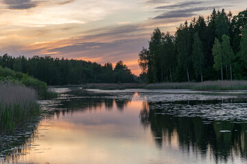picture with beautiful colorful sunset over the lake, a wonderful place of strength and energy, peace, harmony and quiet