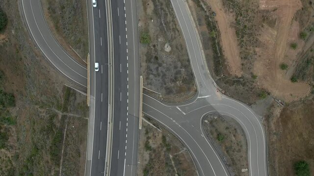 Aerial drone Top view of Highway road in Odeleite Dam reservoir - Algarve, Portugal