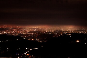 long exposure timelapse of city at night from top 