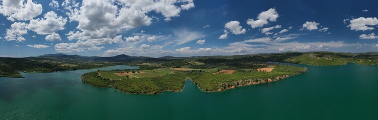 Aerial drone panoramic photo of beautiful nature in artificial lake and dam of Marathonas or Marathon that feeds drinking water supply to Athens, Attica, Greece