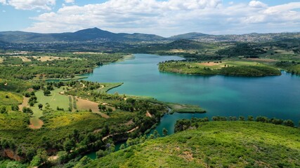 Aerial drone panoramic photo of beautiful nature in artificial lake and dam of Marathonas or...