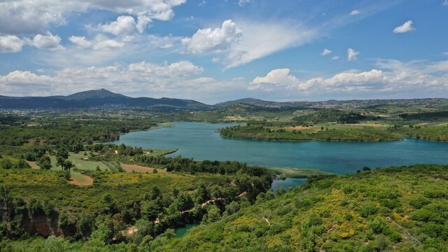 Aerial drone panoramic photo of beautiful nature in artificial lake and dam of Marathonas or Marathon that feeds drinking water supply to Athens, Attica, Greece