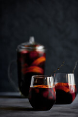 Delicious refreshing sangria. Spanish national drink with oranges, strawberries and ice. Home made production..