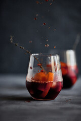 Delicious refreshing sangria. Spanish national drink with oranges, strawberries and ice. Home made production..