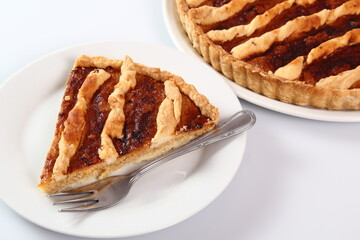 Shoofly Tart with Golden Syrup Filling. Isolated on white background.