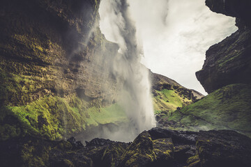Waterfall Kvernufoss in the mountains 3