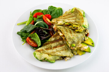 Chicken Quesadilla with avocado, dried tomatoes and jalapeno