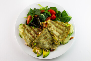 Chicken Quesadilla with avocado, dried tomatoes and jalapeno