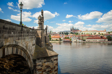 Naklejka premium Prague Charles bridge Prague castle Vltava river sunny day blue sky