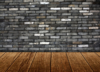 old brick wall and wooden table