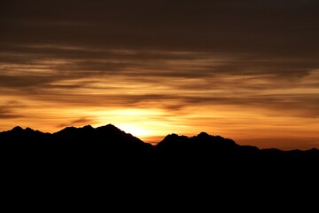 silhouette landscape view of sunrise over the mountains 