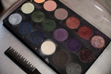 Makeup cosmetics. Work set for a beautician. Brushes, palettes, blush, pigments, eye shadow,...