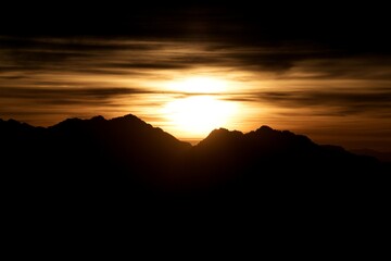 silhouette landscape view of sunrise over the mountains 