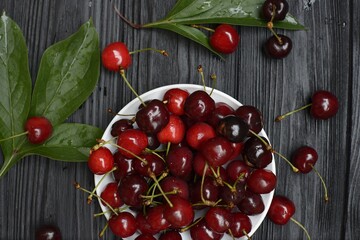 cherries on wooden background