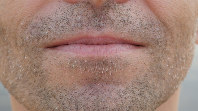 Close-up of unshaved adult male face