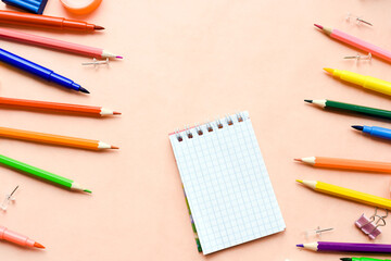 colored pencils and notebook