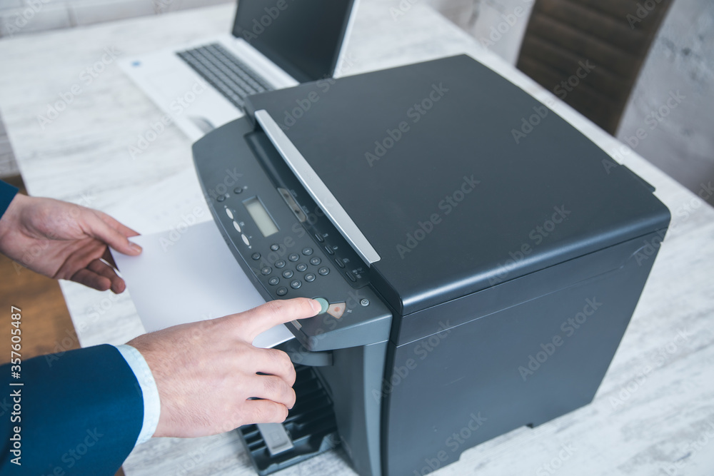 Poster man working in xerox device
