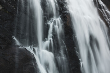 Fototapeta na wymiar Skjervefossen waterfall falling blur water close