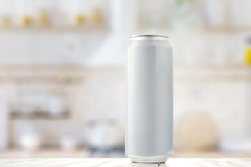 White can of beer on the kitchen table