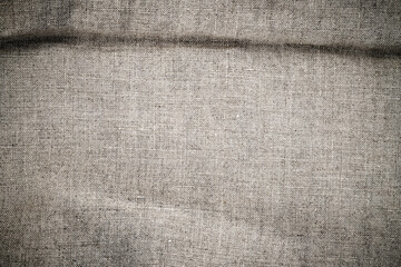 Natural linen texture. Stone washed pure linen texture. Wrinkled linen fabric background.
