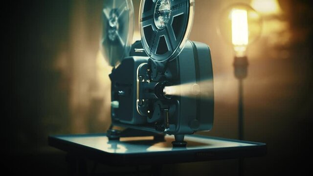 Vintage movie projector in a dimly lit room