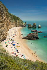 Fototapeta na wymiar Beautiful beach Sesimbra, coast of Portugal
