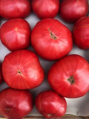 Delicious ripe red tomatoes on the market