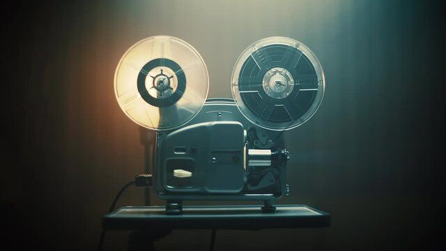 Vintage movie projector playing a film