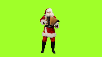 Santa Claus plays accordion against green screen background, Chroma key
