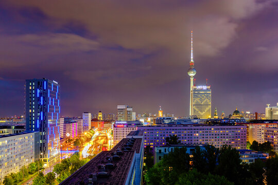 Berlin sunset cityscape aerial view with tv tower in heavy storm conditions