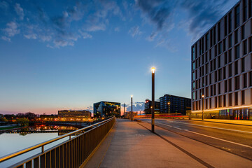 Berlin night office building with spree river