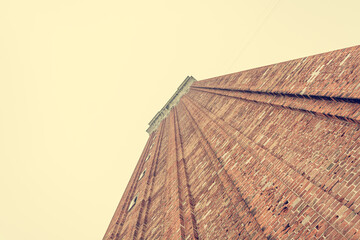A huge bell tower made of red brick in Piazza San Marco - Campanile of St. Marks Cathedral.