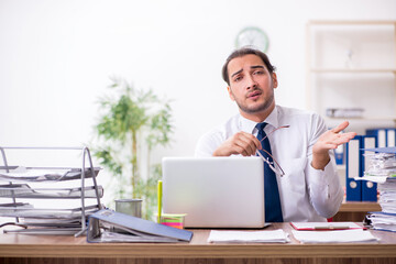 Two employees working in the office