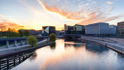 Fototapeta premium Berlin sunset cityscape view with spree river and office buildings