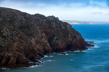 Cliffs on the shore of the Atlantic Ocean. Thunderstorm weather