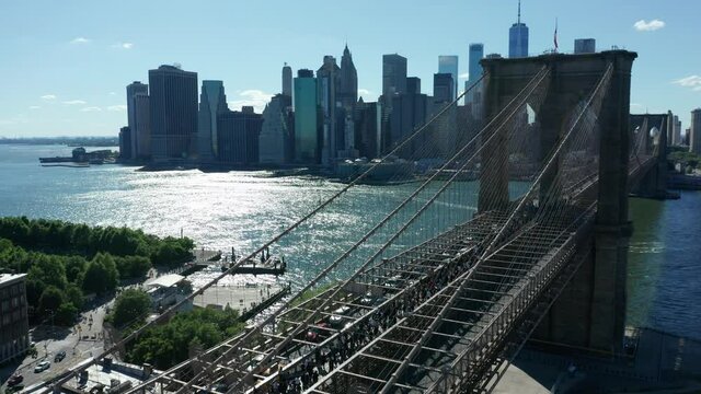 flying alongside Brooklyn Bridge as BLM demonstration marches across towards Manhattan