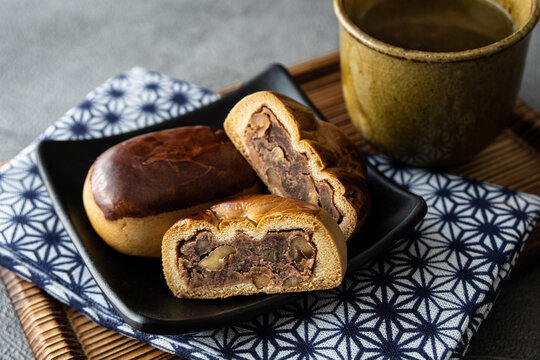 Manju, a traditional Japanese sweet snack often served with green tea.