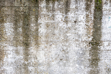 The texture of the concrete with streaks of dirt closeup