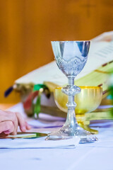 altar with host and chalice with wine in the churches of the pope of rome, francesco