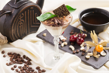 Chocolate mousse with mint in portion glasses