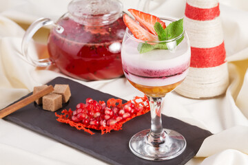 Delicious strawberry sweet cream cheese deserts in glass